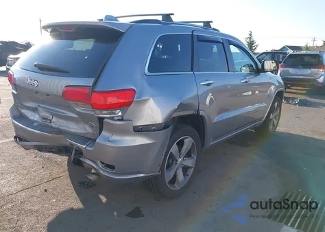 2015 Jeep Grand Cherokee Overland z USA, uszkodzony, nr VIN 1C4RJFCT3FC951491